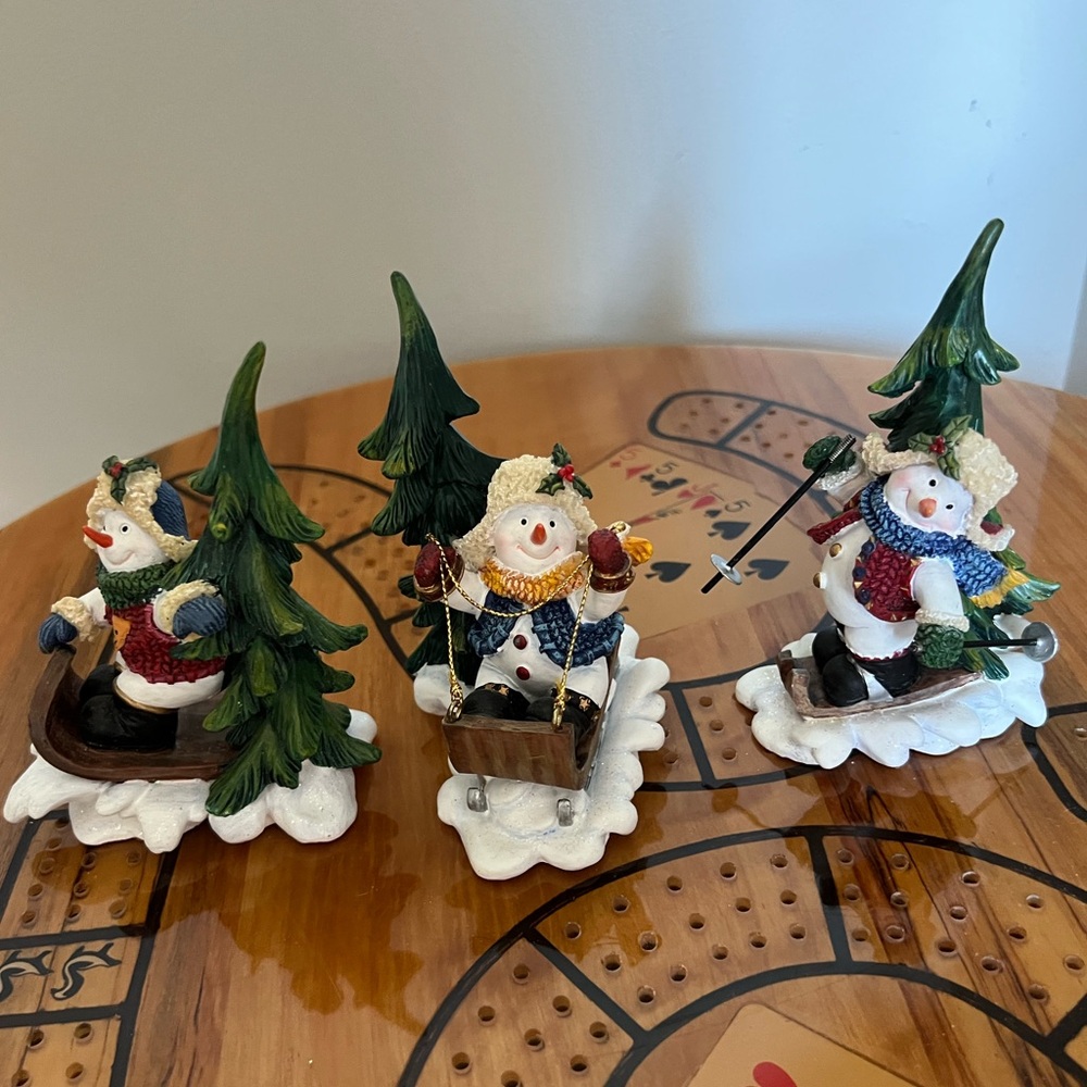 Festive Home Interiors Snowman Figurine Set with snowmen sport activities; Trees